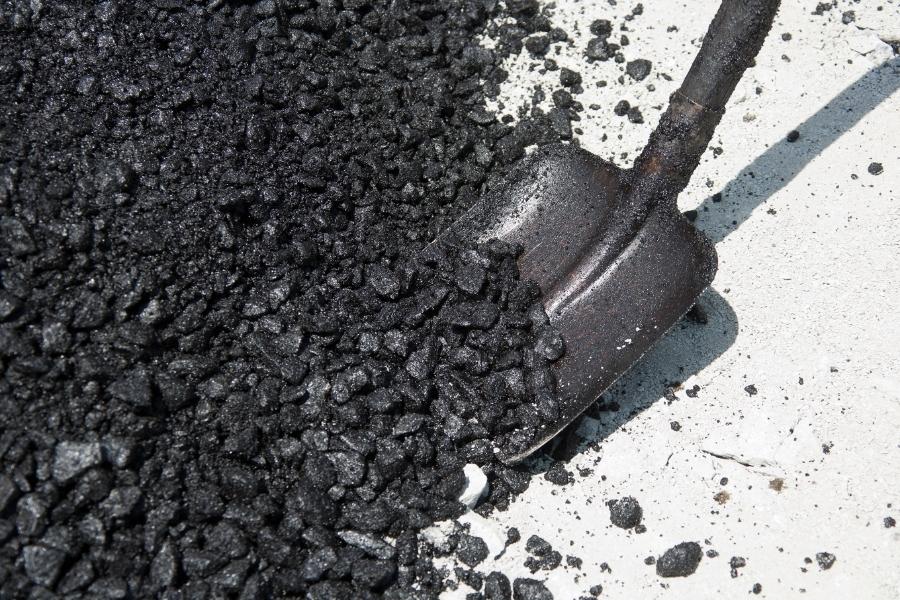 fresh layer of asphalt with shovel gainesville tx